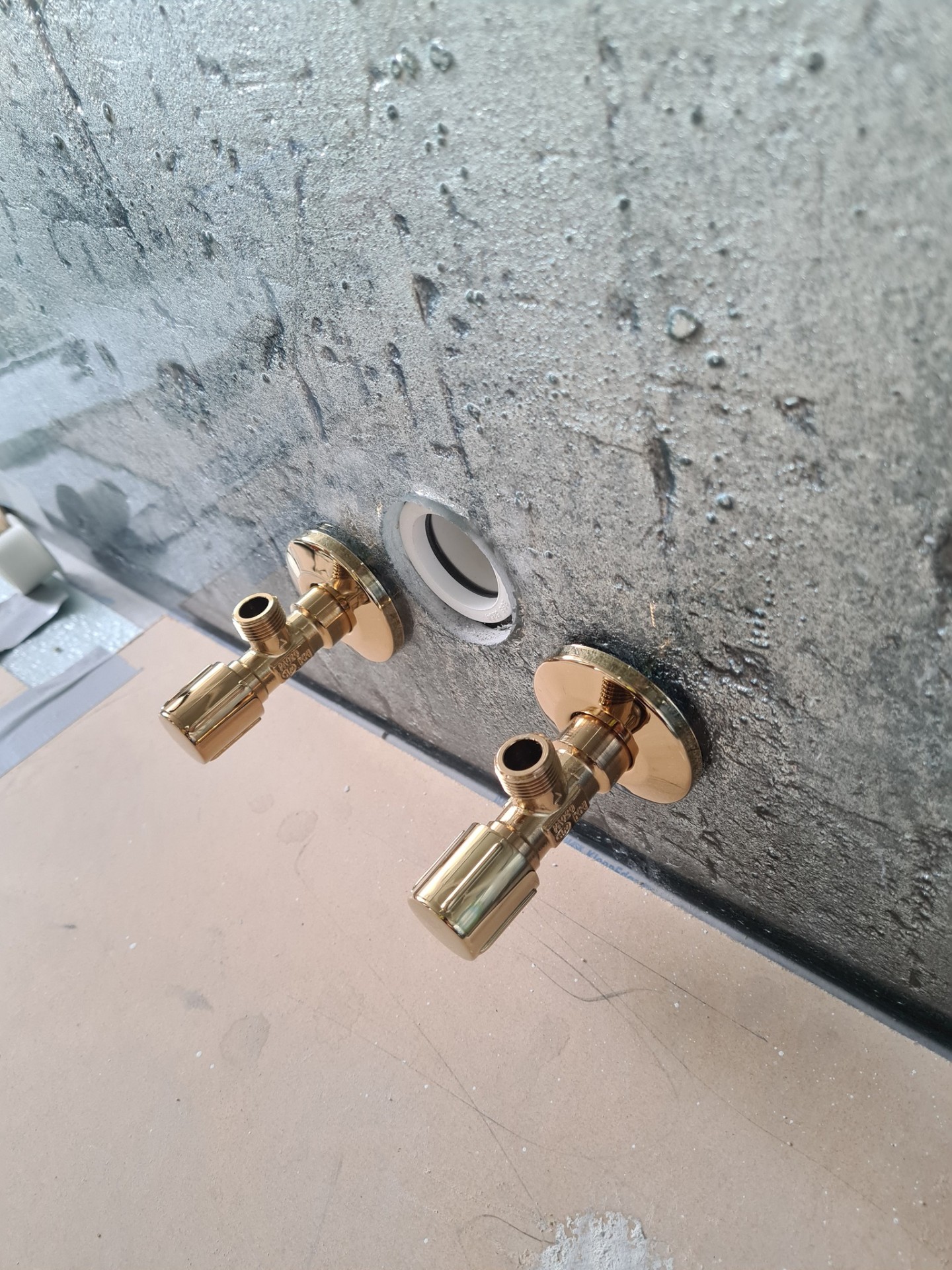 Brass isolation valves installed on copper pipework for plumbing system